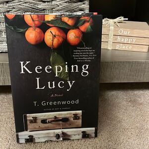 Keeping Lucy A Novel T. Greenwood New In Excellent Condition